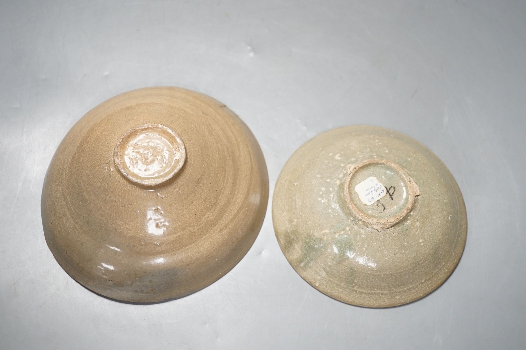 Two Korean celadon bowls or dishes, Goreyo dynasty., largest 17 cms diameter.